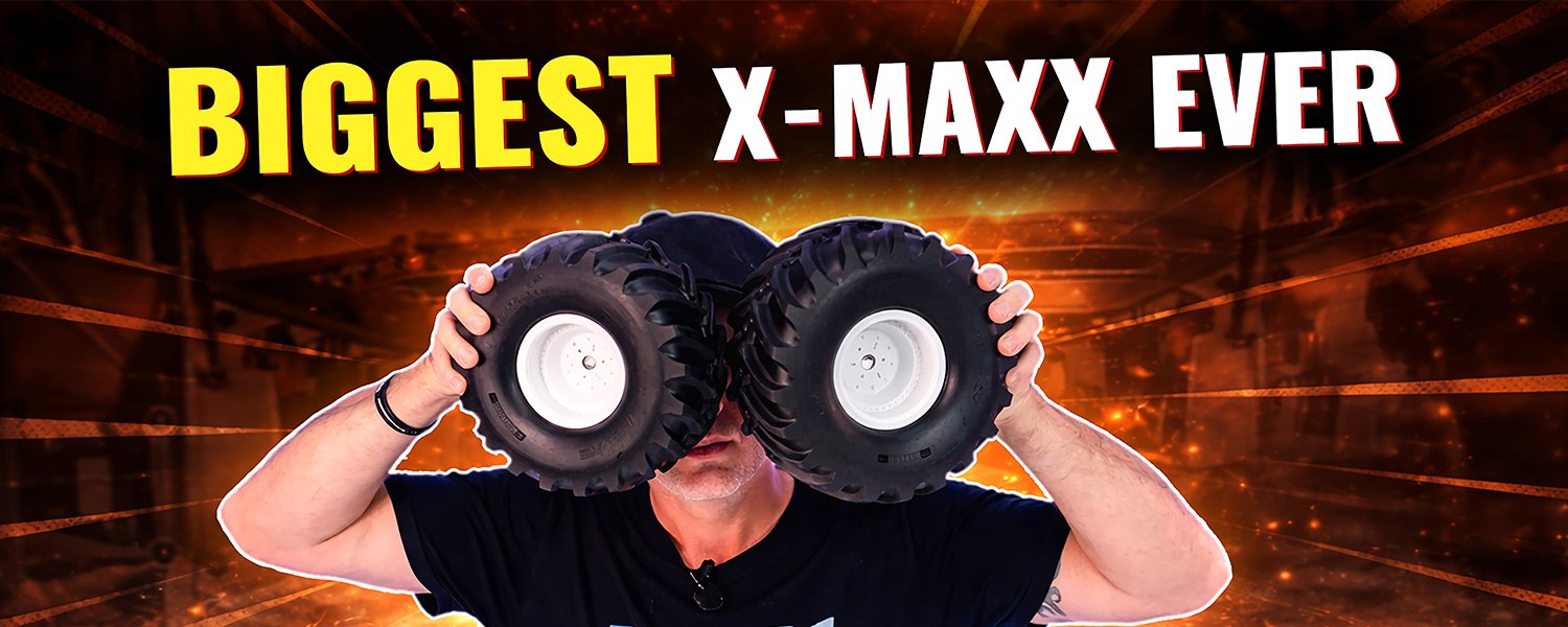 YouTube thumbnail showing a presenter holding oversized RC tyres beneath the headline Biggest X-Maxx Ever.